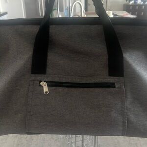 Soft suitcase that becomes hanging garment bag